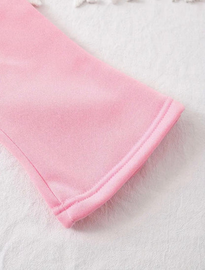 Girls' pink trouser hem and fabric fold detail