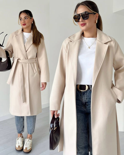 Beige belted long coat with wide lapels and tie waist