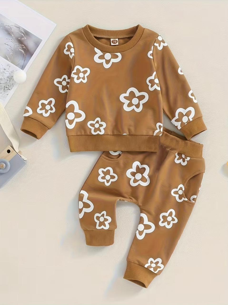 Brown two-piece outfit with white flower print sweatshirt and matching jogger pants