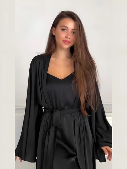 Silk lingerie set: black slip with thin straps under open belted robe, long sleeves