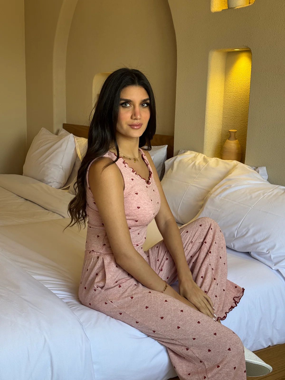Pink heart-print sleeveless lounge top with sweetheart neckline and matching pants