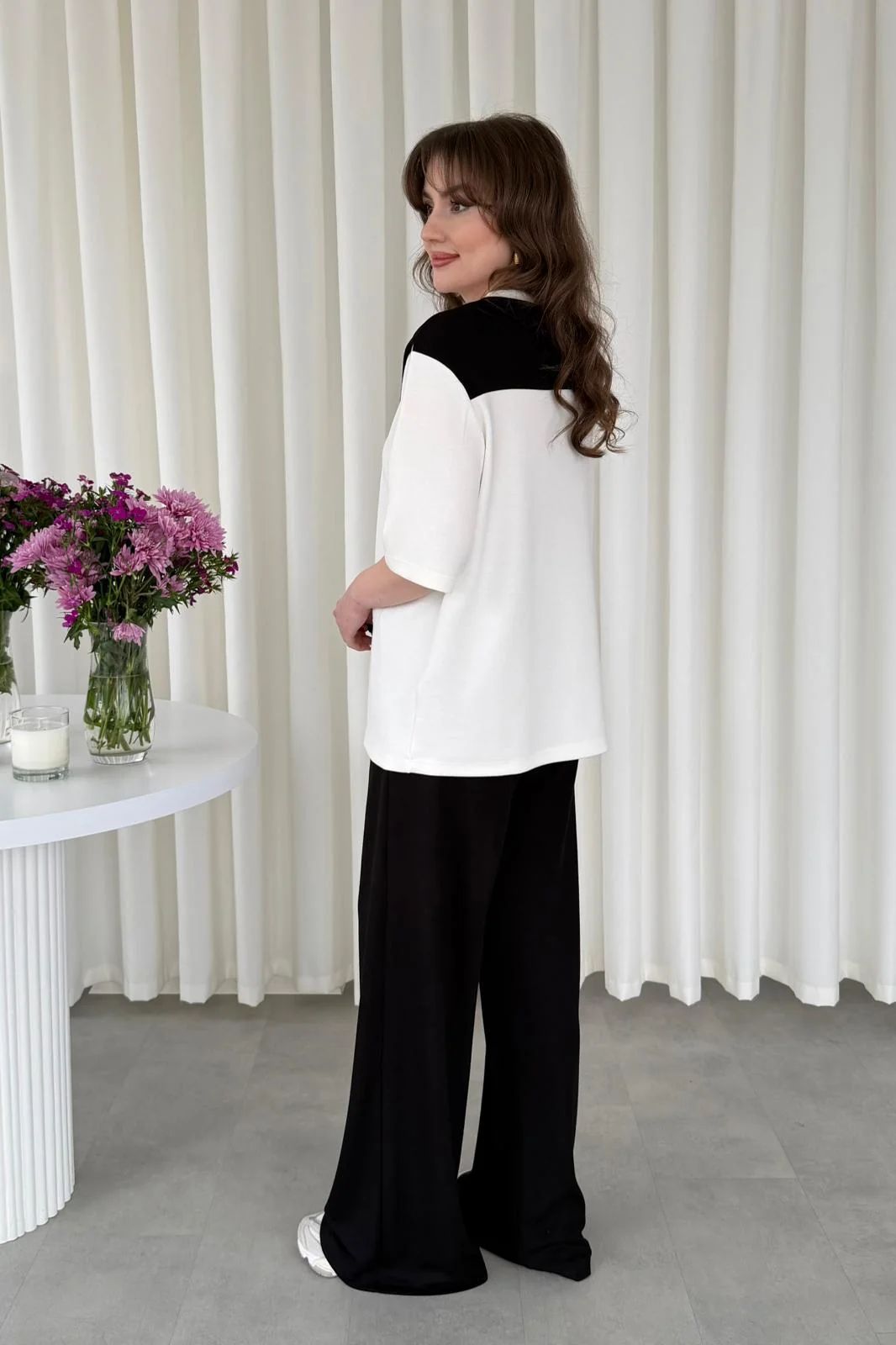 Shoulder-tie 2-piece suit set, white top with black upper back panel and wide-leg black pants