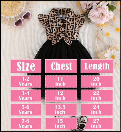 Girls party dress with black tulle skirt and cream geometric bow bodice, sleeveless
