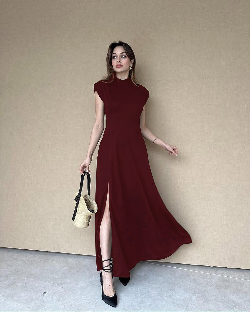 Sleeveless long top dress in maroon, high neck sleeveless with side slit and flowing hem