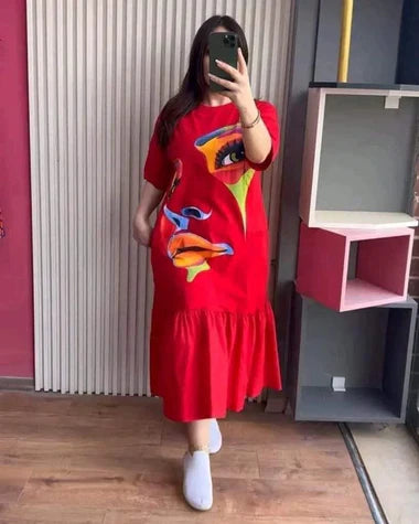 Red printed frill long tee dress with colorful face graphic and ruffled hem