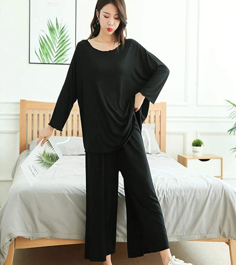 Black 2-piece lounge set with long-sleeve top and wide-leg pants, relaxed fit